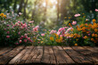 Spring flowers on wooden table in garden with pink blossoms, surrounded by nature's beauty