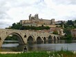 Béziers, May 2024: Visit the magnificent city of Béziers in Occitanie. Street photos - View of Saint-Nazaire and Saint-Celsus cathedrals With the Pont Vieux