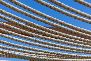 Wall Mural - Tackle ropes on blue sky background