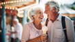 Joyful laughing Senior Couple Enjoying Ice Cream at Summer Amusement Park