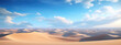 Sand dunes under blue sky with white clouds, peaceful desert landscape