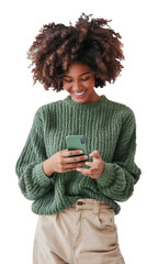 Portrait of a joyful young black woman in a green sweater, smiling as she interacts with her smartphone, isolated on a transparent background