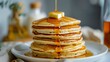 AI generated illustration of a stack of fluffy pancakes dripping with maple syrup