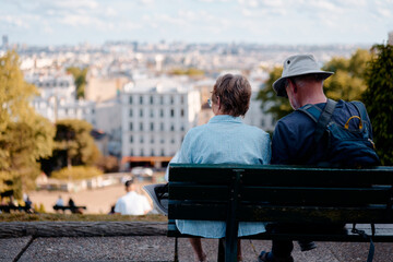 Wall Mural - Couple of tourist enjoying the view of Paris, France