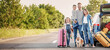© Pixel-Shot - Happy family with luggage near car outdoors
