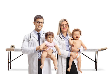 Poster - Pediatric doctors with babies in a clinic