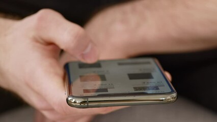 Poster - Man browsing on cellphone, scrolling pictures on device screen, close up