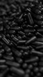 Closeup of black pills with shallow DOF. Drugs, pills, tablets, medicine concept. 3d render illustration