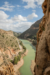 Wall Mural - hiking trail caminito del rey, kings walkway, in Malaga Spain. narrow footpath leads through natural beauty mountain range cliff faces of gaitanes gorge. hisotric landmark popular tourist attraction