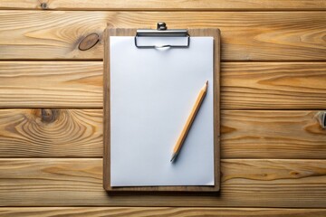 Clipboard with blank paper and pencil on wooden table. Top view.