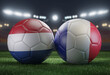 Two soccer balls in flags colors on a stadium blurred background. Group D. Netherlands and France. 3D image.