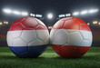 Two soccer balls in flags colors on a stadium blurred background. Group D. Netherlands and Austria. 3D image.