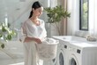 Woman Holding Laundry Basket in Front of Washing Machine