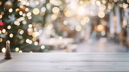 Wall Mural - Christmas background with empty white wooden table over bokeh lights.