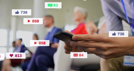 Poster - Image of media icons over caucasian businessman using smartphone