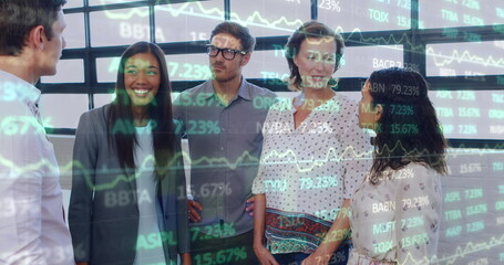 Poster - Image of trading board over diverse happy colleague discussing while standing in office