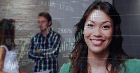 Poster - Image of graphs and trading board, biracial smiling businesswoman with coworkers in background
