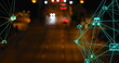 Digital interfaces overlaying blurry city street at night, showing connectivity