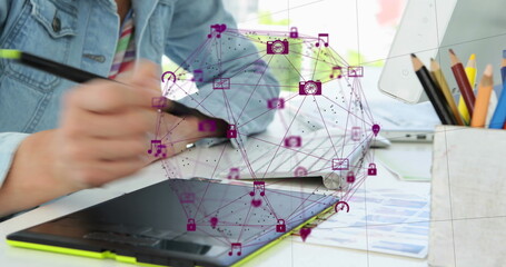 Poster - Person in denim jacket draws on tablet, with a digital interface floating above