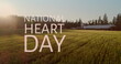 Image of national heart day text over landscape
