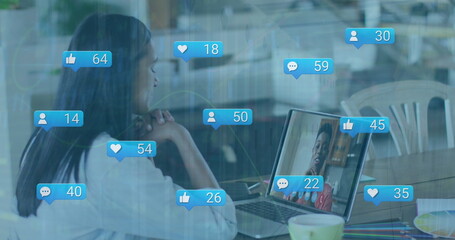 Poster - Image of digital interface and falling icons over biracial women using laptop