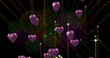 Image of purple hearts over fireworks on black background