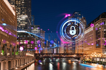 Wall Mural - Chicago cityscape at night with a digital hologram of a padlock, representing security technology concept, on an urban river background. Double exposure