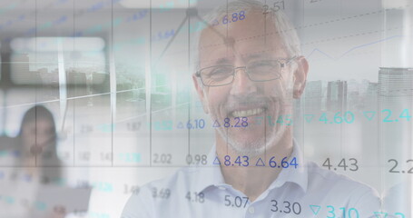 Poster - Image of trading board and modern cityscape, smiling senior caucasian man standing arms crossed