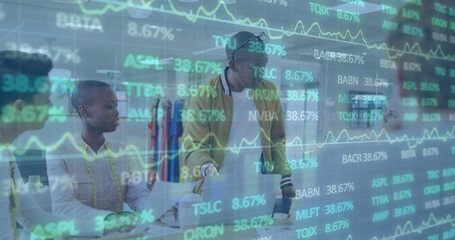 Poster - Image of trading board over diverse coworkers discussing reports on laptop in office