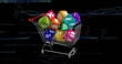 Digital image of icons over cubes in shopping cart and digital waves on black background