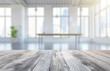 Empty wooden table with a blurred office background, ideal for product display, Generative AI.
