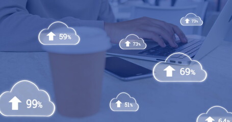 Poster - Image of clouds with changing numbers over caucasian man working over laptop by coffee on desk