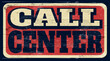 Aged and worn call center sign on wood