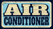 Aged vintage air conditioner sign on wood