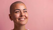 © Wonderful Studio - A woman with a shaved head is smiling, cancer patient with chemotherapy