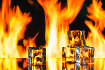 Wall Mural - fire and ice cubes on a black background, place under the text