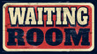 Aged and worn waiting room sign on wood