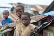 Poor black African children kids on a slum roof top