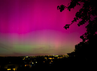 Wall Mural - northern lights over the field in the night in Vogtland Reichenbach germany