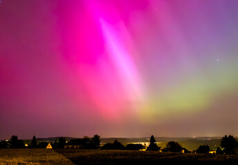 Wall Mural - northern lights over the field in the night in Vogtland Reichenbach germany