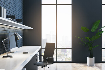 Poster - Side view of contemporary dark home office interior with workplace, window with city view and brick wall, decorative plant. 3D Rendering.