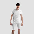 Mockup of white compression suit on man with beard, male t-shirt, shorts, front view, isolated on background in studio.