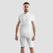 Template of white male t-shirt, shorts, compression suit on athletic man, front view, for design, print, branding, advertising.