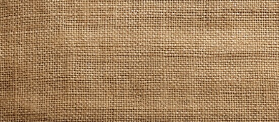 Aufkleber - Top view of a burlap linen fabric surface resembling the texture of a hessian sack creating a textured background for a copy space image