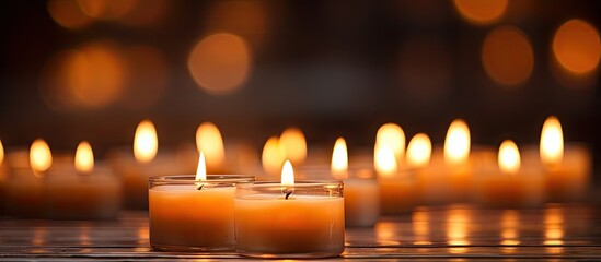 Aufkleber - The soft flickering glow of candle lights creates a warm and cozy ambiance perfect for relaxation and intimacy. with copy space image. Place for adding text or design