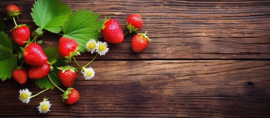 Aufkleber - Close up of wild strawberries on a wooden background providing ample copy space for images