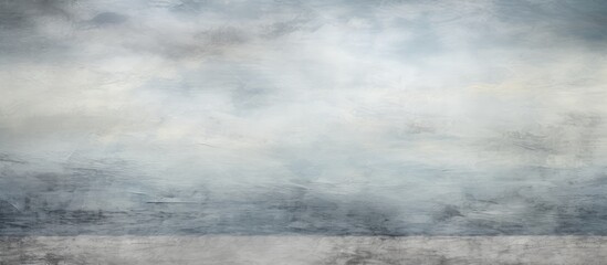 Poster - An abstract landscape with a cloudy gray sky and ocean featuring a captivating mix of handmade textured art papers offering a captivating copy space image