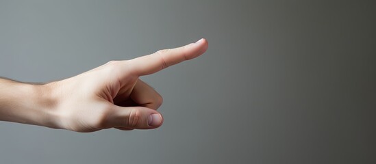 Aufkleber - The hand gesture of the isolated model on a plain background indicates a break sign Copy space image
