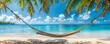 Sandy beach hammock swaying between palms with a backdrop of crystal waters and blue sky, inviting peacefulness
