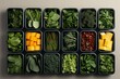 Various greens and vegetables in plastic containers